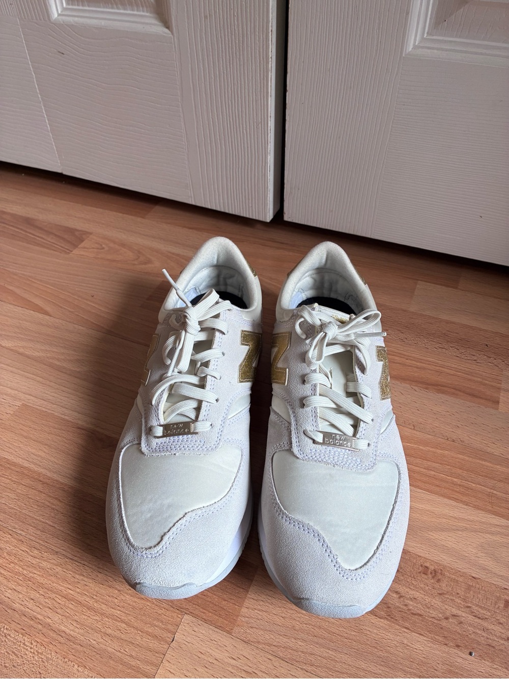 New Balance Beige Sneakers with Gold Detail
